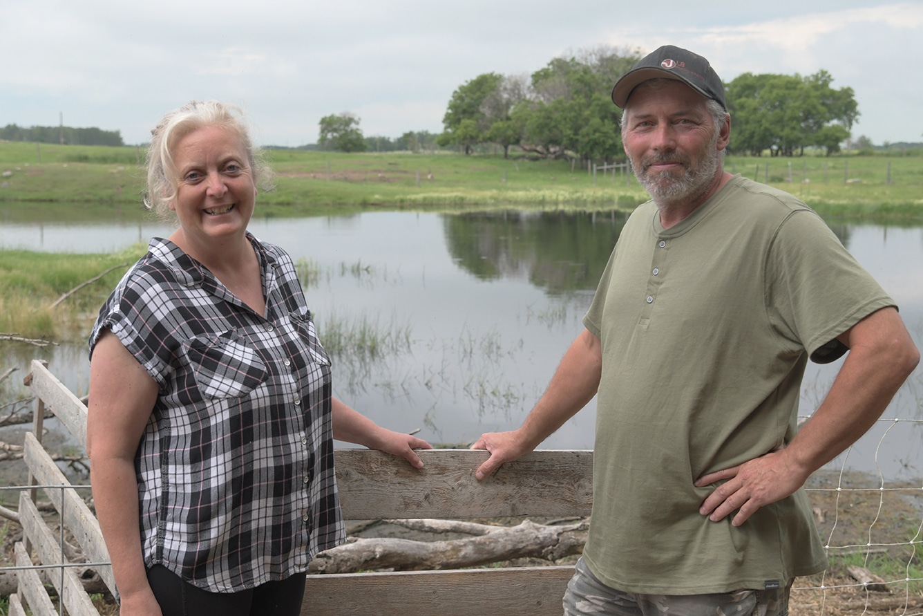 Angela and Tony Prynne on their farm near McAuley MB (photo DUC)